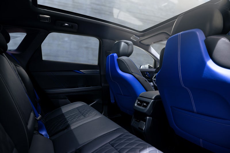 Back Seat View of the 2026 OPTIQ-V Blue Front Seats, Sun Roof, and Interior | Watsonville Cadillac in Watsonville CA